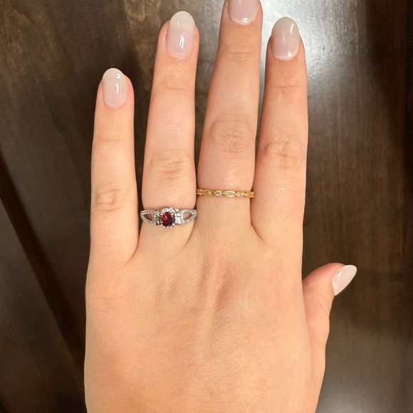 Jewelry - Beautiful new Size 8 ring. Silver rhinestone band with red stone women’s jewelry